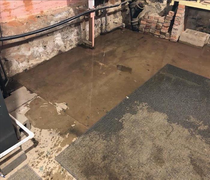 Flooded concrete basement