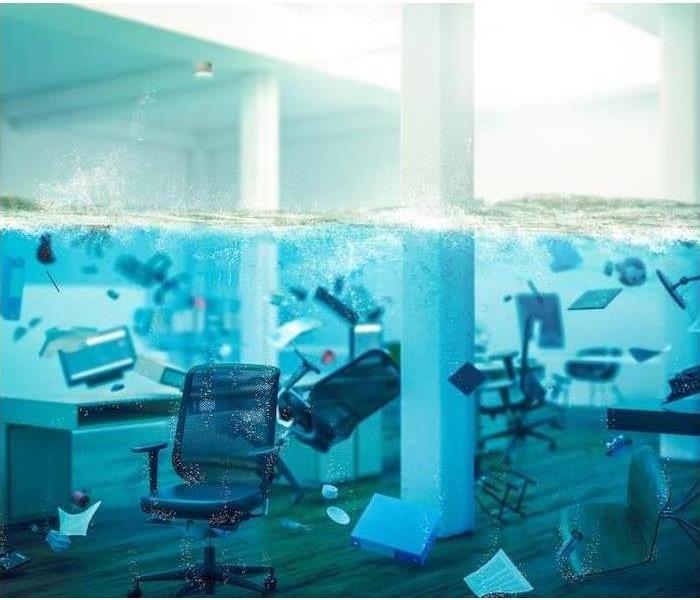 Chairs and office supplies floating in water