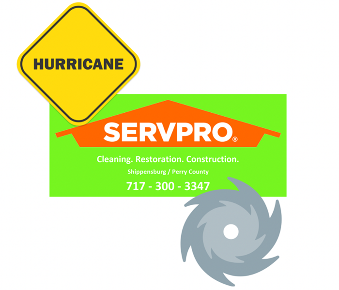 Servpro symbol, hurricane symbol and a precaution sign 